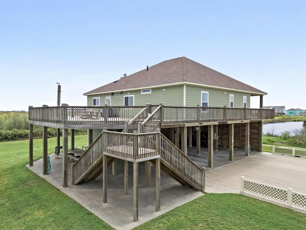 907 THOMPSON DR, GILCHRIST, TX 77617, photo 1 of 48