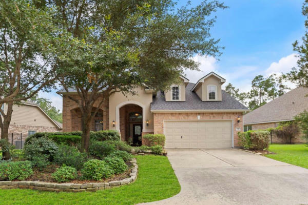 55 N ROCKY POINT CIR, THE WOODLANDS, TX 77389 - Image 1