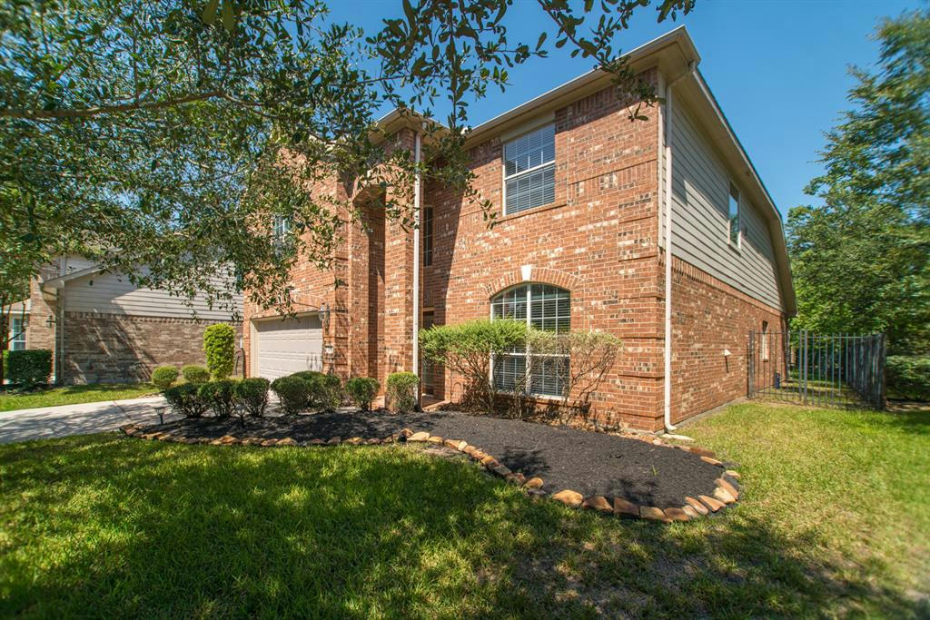 139 S ROCKY POINT CIR, THE WOODLANDS, TX 77389, photo 1 of 50