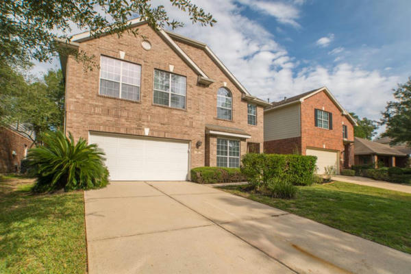 43 N SPINNING WHEEL CIR, THE WOODLANDS, TX 77382, photo 4 of 50
