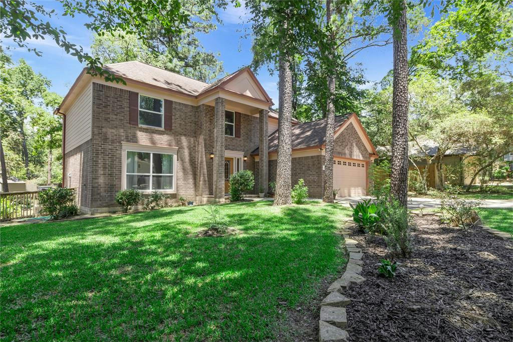 22 S TALLOWBERRY DR, THE WOODLANDS, TX 77381, photo 1 of 37
