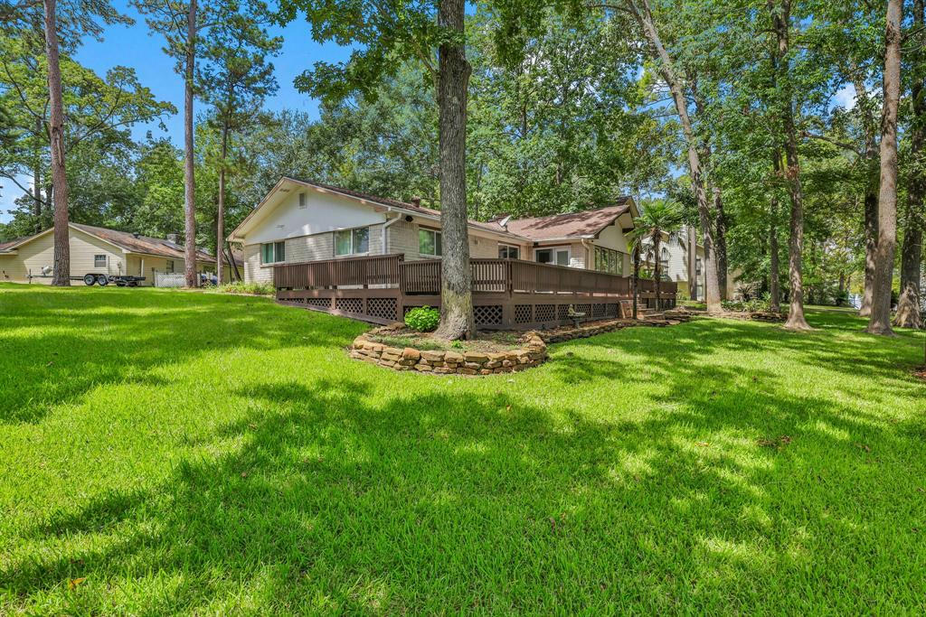 21 EDGEWATER LN, COLDSPRING, TX 77331, photo 1 of 39
