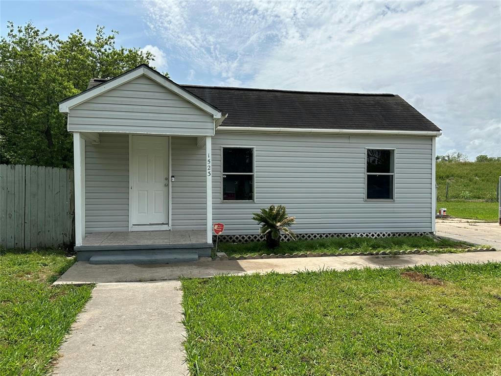 1523 N AVENUE F, FREEPORT, TX 77541, photo 1 of 11