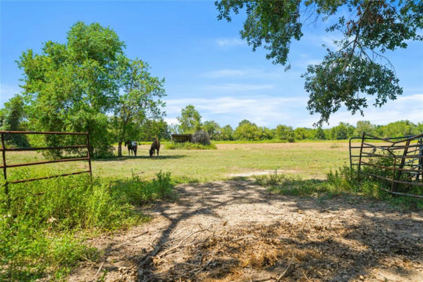 855 COUNTY ROAD 15, DAMON, TX 77430 - Image 1