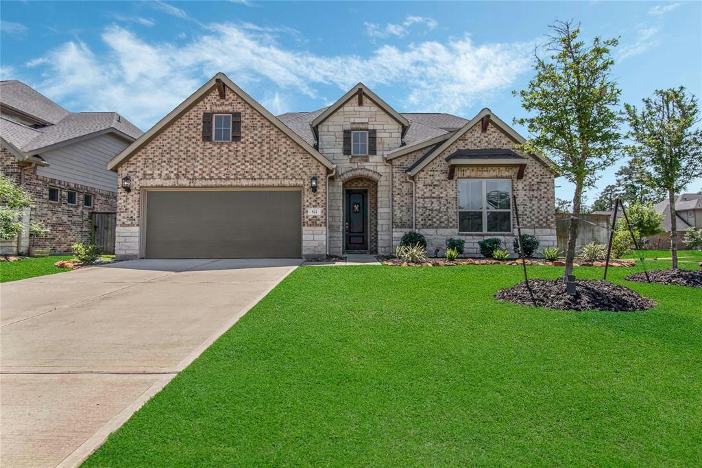 527 WILLOW CANYON LN, PINEHURST, TX 77362, photo 1 of 34